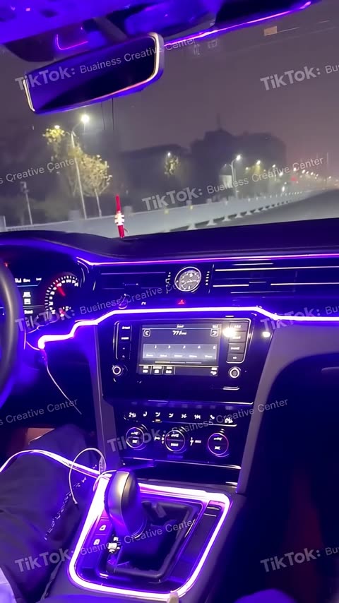 AI-generated frame: dashboard fully lit in purple LED glow